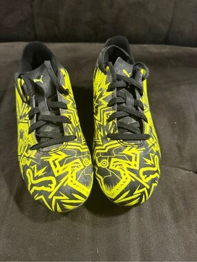 Puma and Pulisic Kids Black & Yellow Soccer Sneakers